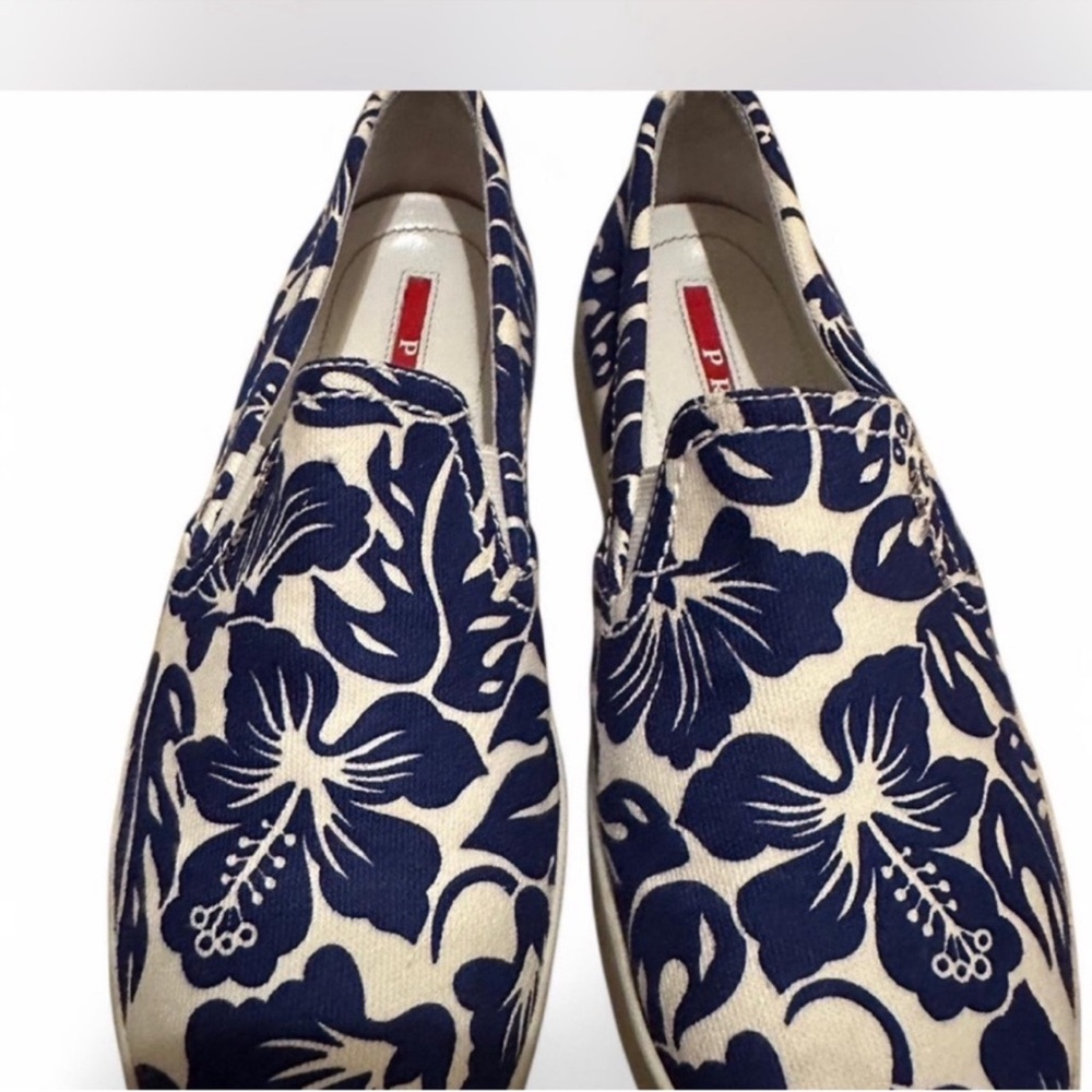 🌺 Prada Floral Slip-On Sneakers – Effortless Luxury Meets Island Chic! 🌺